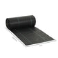 Rolled dark gray weed barrier fabric with teal edge stitching lines