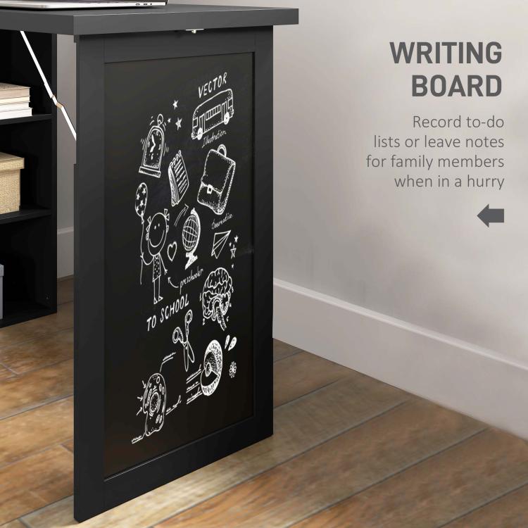 Black chalkboard writing panel on fold-out office desk cabinet