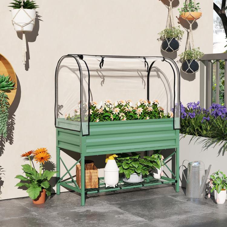 Green raised garden bed with clear arched cover panels and metal bottom shelf