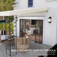 Wall-leaning pergola canopy with cream roof and black metal frame posts