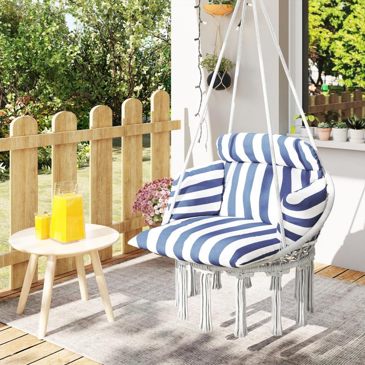 Blue and white striped hammock swing chair with macrame seat and fringed cushion