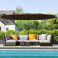 Brown patio market umbrella with LED solar light string, open canopy and central pole