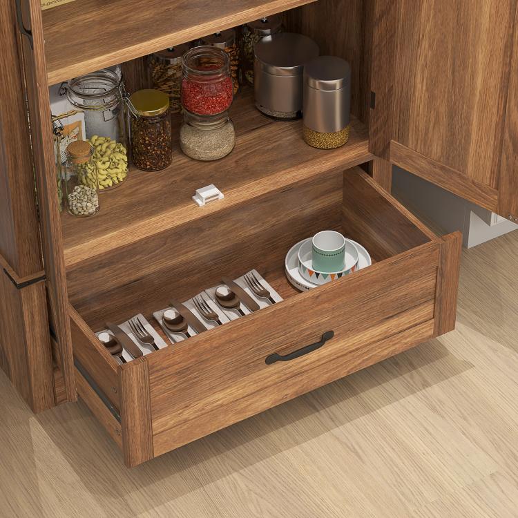 Brown farmhouse pantry cabinet with two doors, open shelves, and bottom drawer