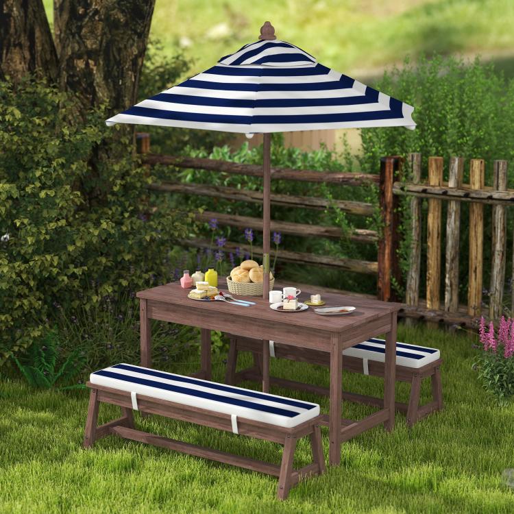 Kids wooden picnic table with navy striped umbrella and striped bench cushions