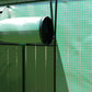 Small outdoor portable greenhouse frame with rolled green UV cover