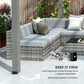 Gray pergola post base with metal mounting brackets and L-shaped plates