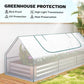 Transparent mini greenhouse cover over white raised planter bed with black frame