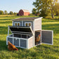 Wooden chicken coop with side door open, nesting box windows, dark roof