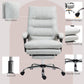 Light gray microfibre massage chair with thick padding, gas lift base, and swivel design
