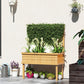 Raised wood planter bed with trellis, filled with mixed green plants