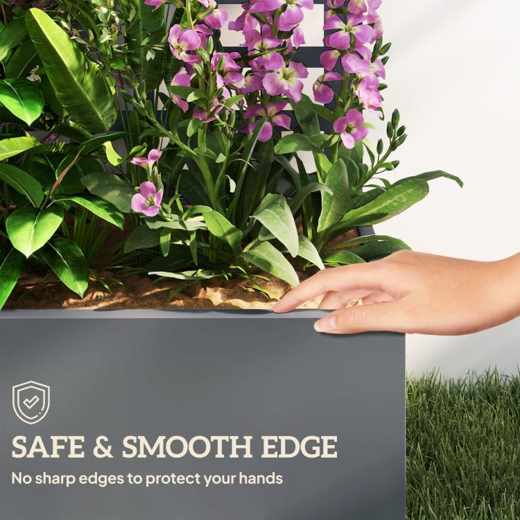Gray planter box with smooth edge, purple orchid-like flowers, and green leaves