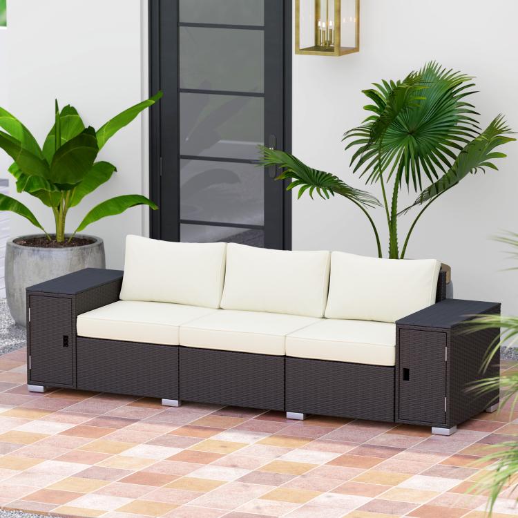 3-seat outdoor wicker couch with cream cushions and dark armrest storage compartments