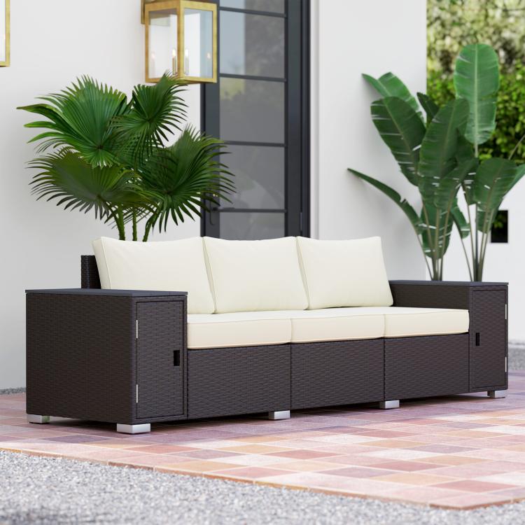 3-seat outdoor wicker sofa with armrests and storage, cream cushions on dark frame