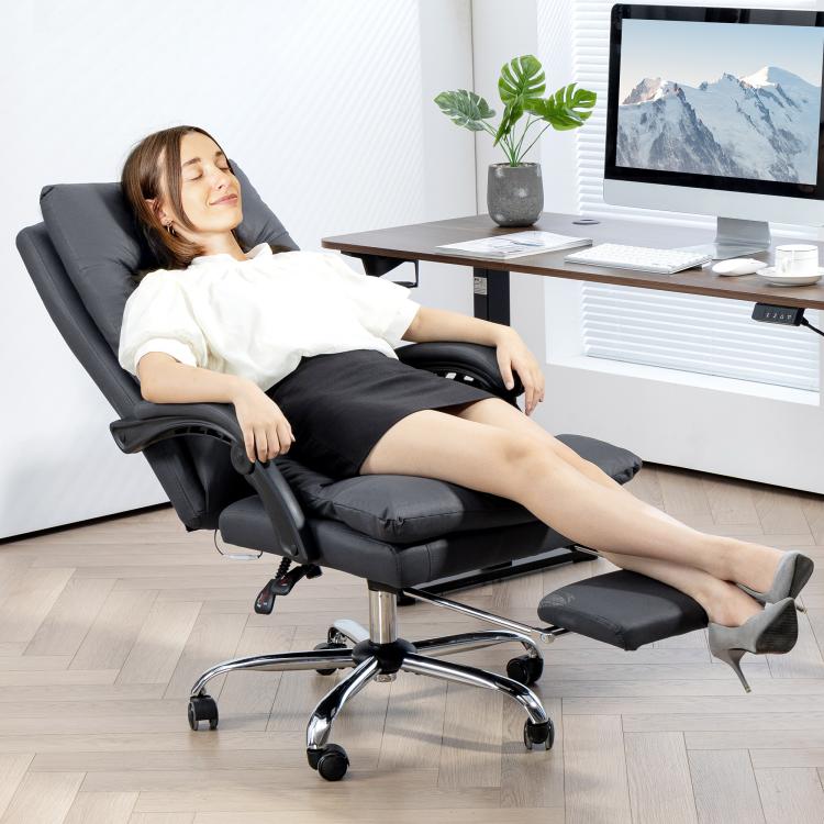 Dark gray reclining massage office chair with footrest, swivel base, and padded headrest