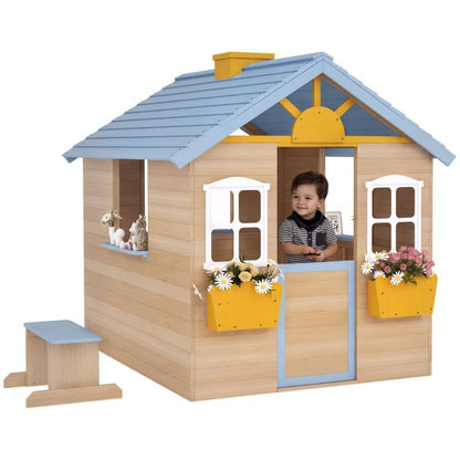 Kids wooden playhouse with blue roof, front door, and two white windows