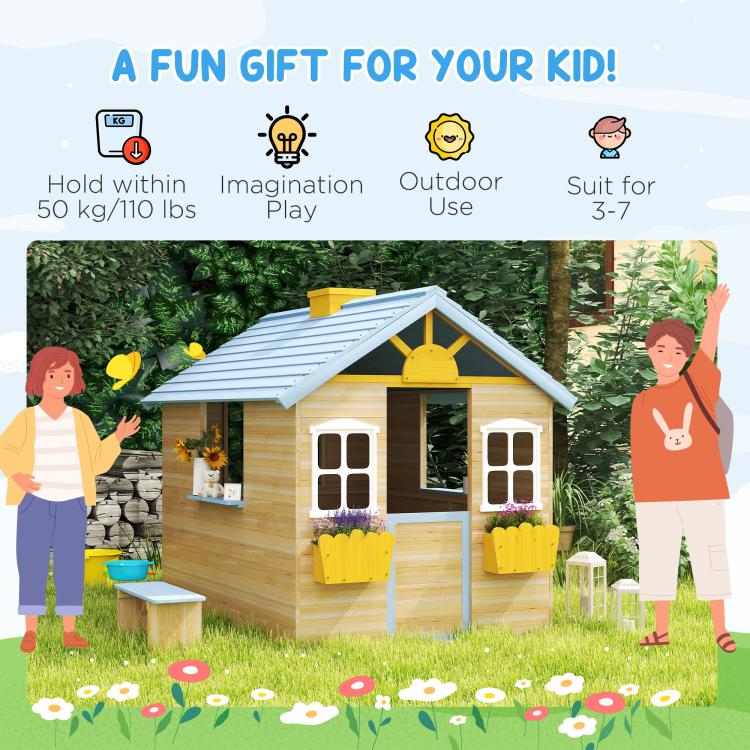 Kids wooden playhouse in outdoor scene with blue roof, door, windows, and flower boxes