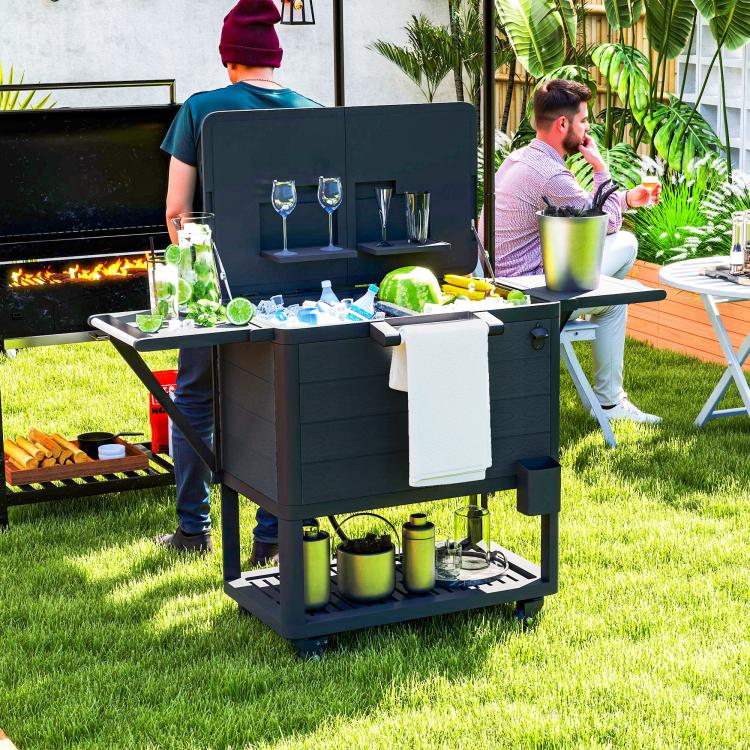 Black outdoor cooler cart with open top, side table arms, and two beverage racks.