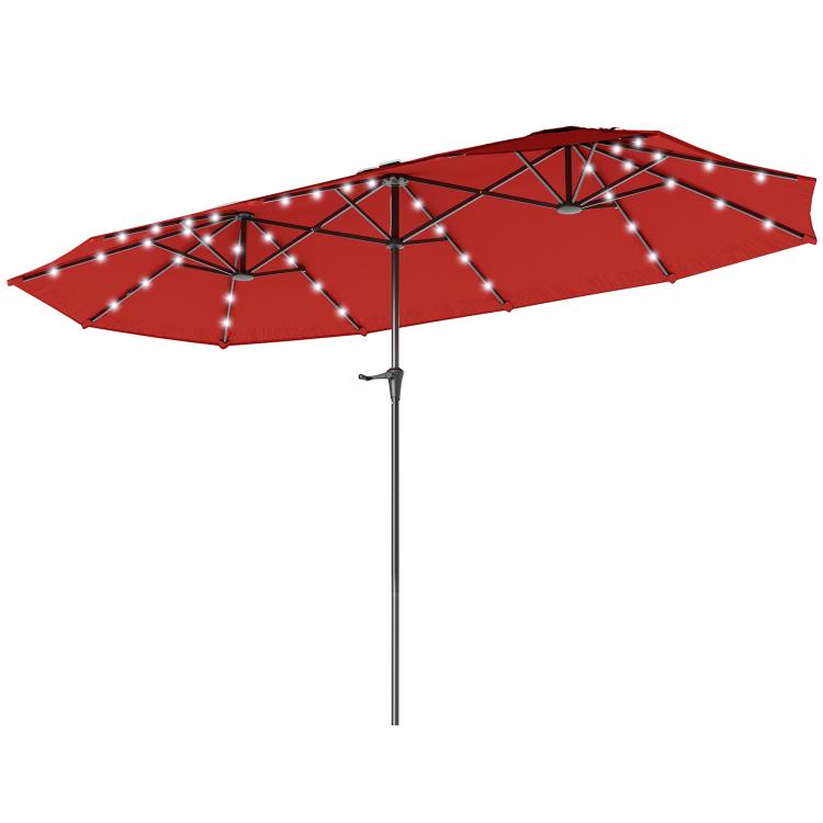Wine red double-sided patio umbrella open with solar LED light strips under canopy
