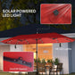 Wine red patio umbrella showing solar LED light panels and on/off switch