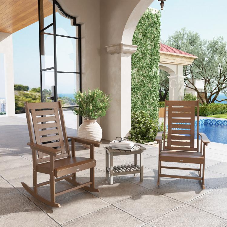 Brown high-back rocking chair with slatted back and wide armrests