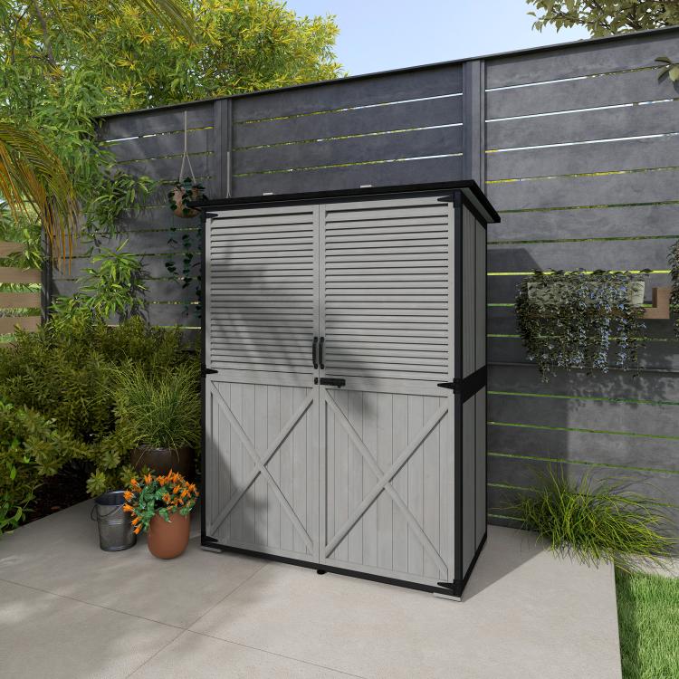 Gray outdoor wooden storage shed with double louvered doors and cross-braced lower panel