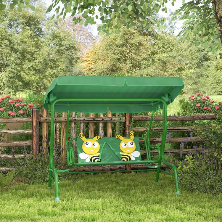 Dark green kids patio swing chair with adjustable canopy and two-seat cushion outdoors