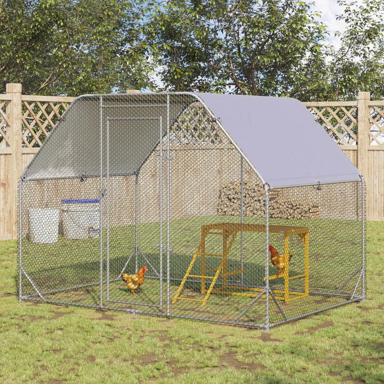 Wooden chicken activity pen with mesh sides and slanted roof