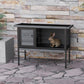 Gray elevated wooden rabbit hutch with wire enclosure and door, rabbit inside
