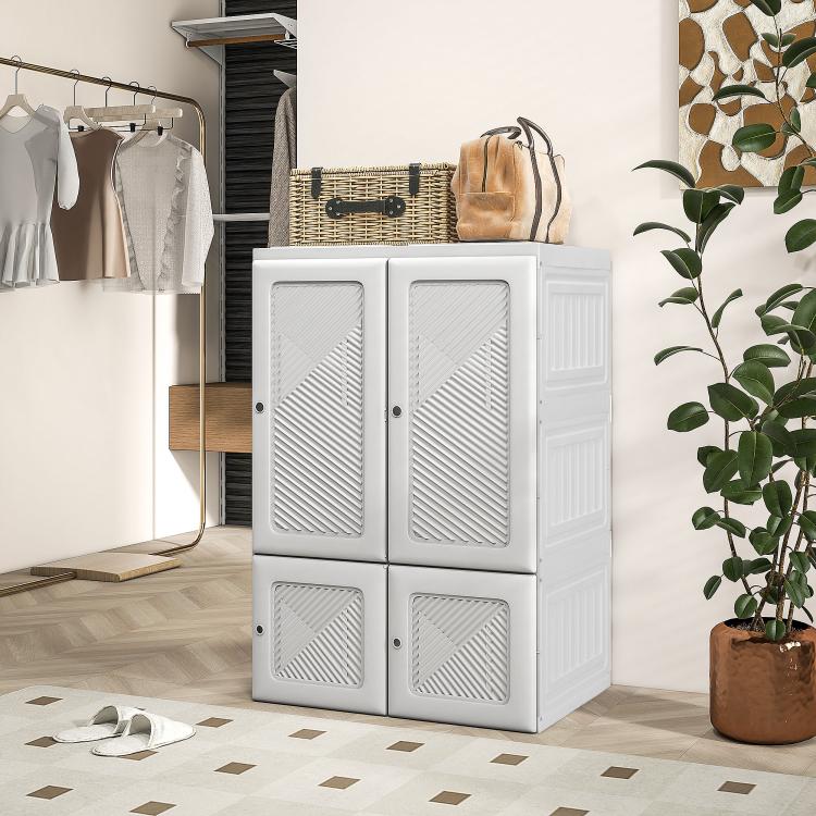 White foldable wardrobe cabinet with four vented door panels and lower storage doors.