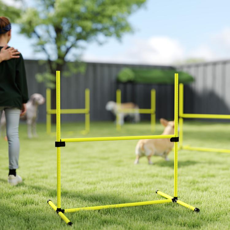 Yellow adjustable dog agility jump frame with horizontal top bar and side posts