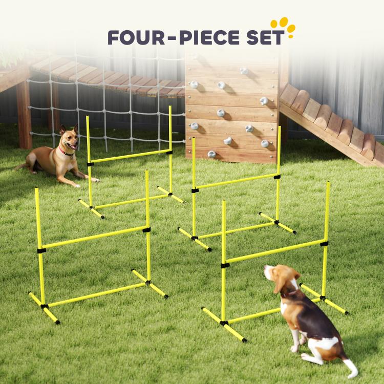 Four-piece yellow dog agility jump bar set with black clamps and multiple hurdle sections