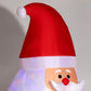 Inflatable red Santa yard display with white beard and pink-lit face
