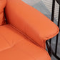 Orange recliner seat cushion close-up with stitched seams and smooth finish