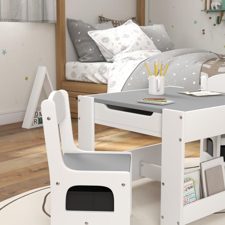 Kids table and chair set close-up with gray tabletop, white chairs, and under-shelf bins