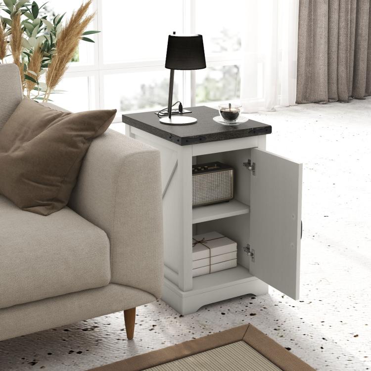White end table with black top and open storage compartment behind front cabinet doors
