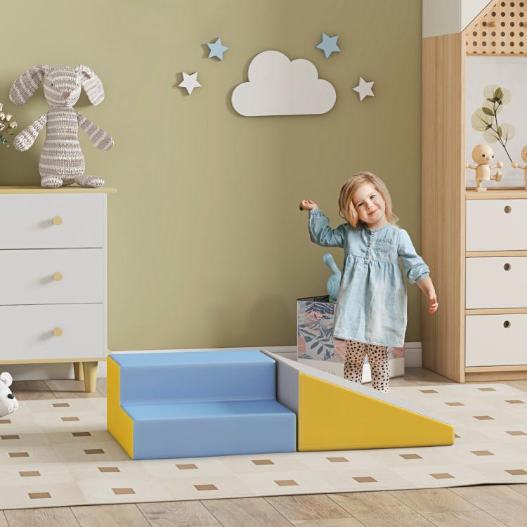 Blue, yellow, and gray modular foam steps and slide activity set