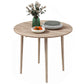 Round drop-leaf dining table, light oak wood top with four slender legs