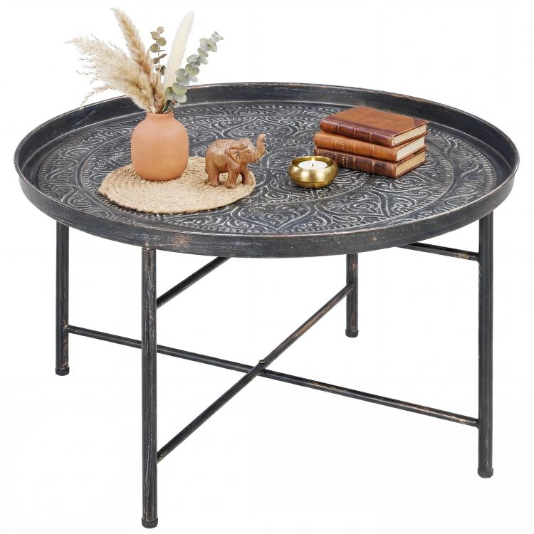Round coffee table with hammered tray top and dark metal frame, pewter-style finish