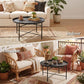 Round hammered-tray coffee table with dark metal X-frame base and metal legs