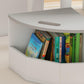 White kids table storage shelf with books in an open cubby
