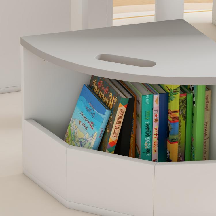 White kids table storage shelf with books in an open cubby