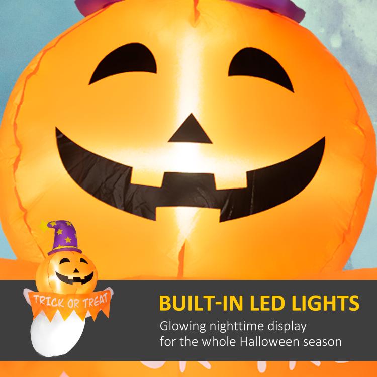 Inflatable pumpkin-face ghost with purple hat and “Trick or Treat” banner, built-in LED lights