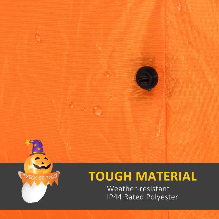 Inflatable Halloween ghost with orange pumpkin face, purple hat, water-resistant fabric cover