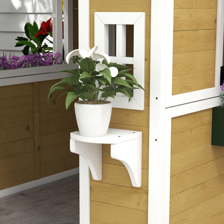 Kids wooden playhouse side with white planter shelf and pot on beige panel wall