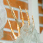 Hanging Halloween ghost prop with outstretched white netting fingers
