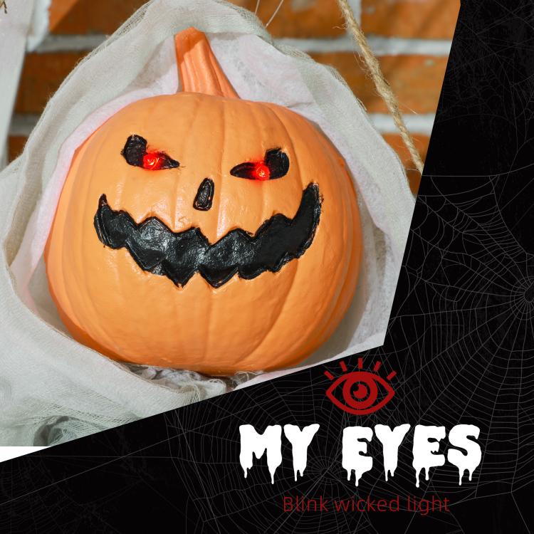 Orange jack-o’-lantern pumpkin face with glowing red eyes on white hanging ghost hood