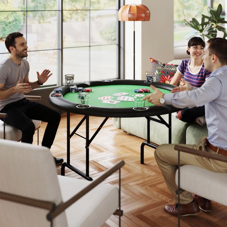 Foldable poker table with green felt used for chips and card play