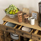 Brown kitchen storage sideboard with solid wood top and open drawers for dishes