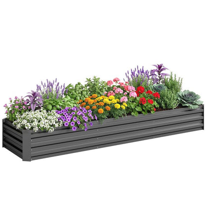 Dark gray raised galvanized garden bed filled with colorful flowers and herbs