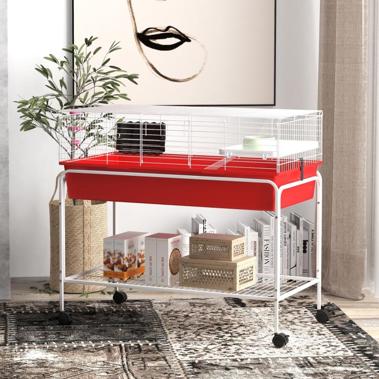Red two-level small animal cage with wire frame, rolling stand, and lower accessory shelf